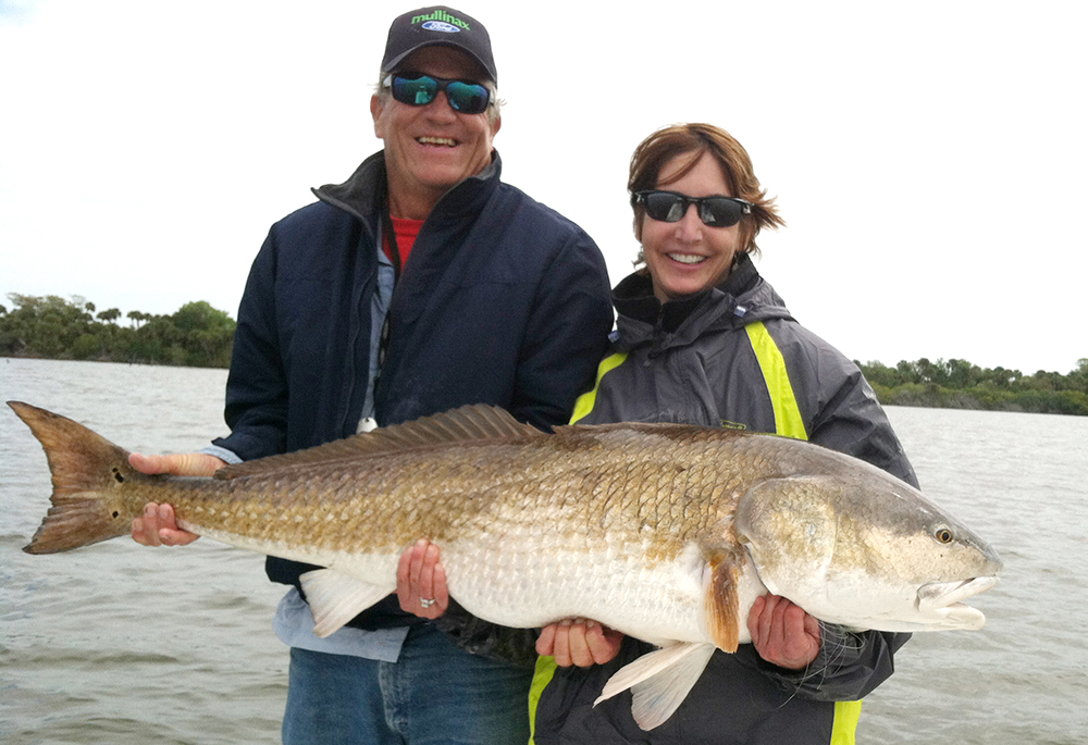Holly Vereb of Fishers with Capt. Bob Fishers and her record catch. (Submitted photo)