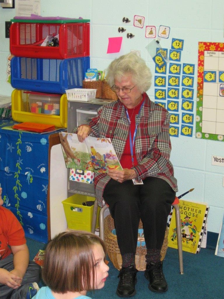 ReadUP Readers volunteer, Mildred Flanary, shares her love of reading with preschool students at Presbyterian Preschool Ministries.