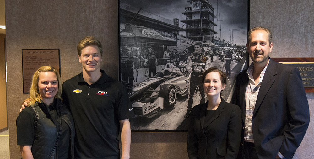(From left to right) Sarah Fisher, of CFH Racing, Josef Newgarden, an Indy Car driver, Elizabeth Varner, from the National Art Museum of Sports, and photographer Chris Bucher gather after Bucher received his award. (Submitted photos)