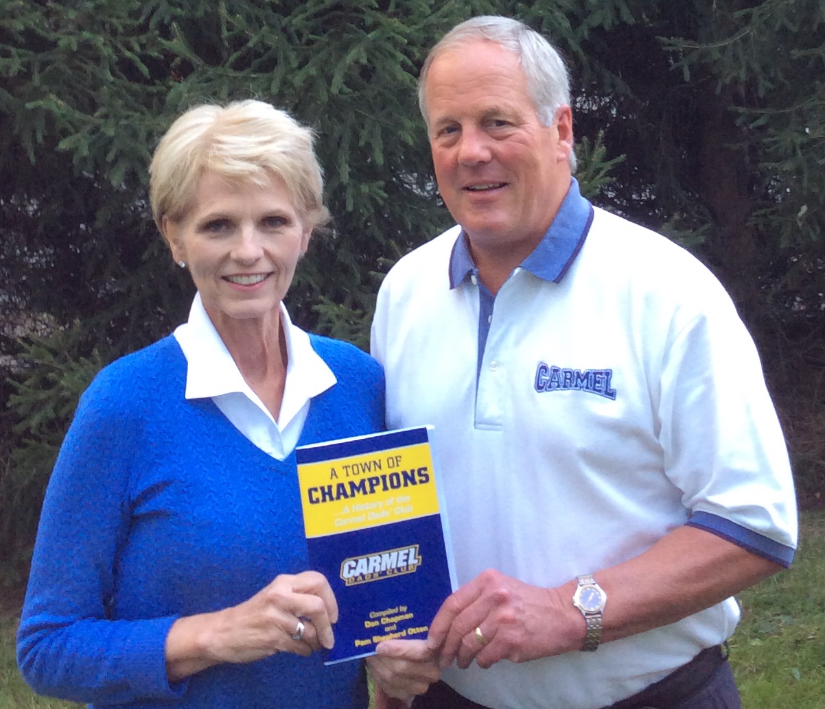 Pam Shepherd Otten and Dan Chapman with their new book on Carmel Dads Club. 
