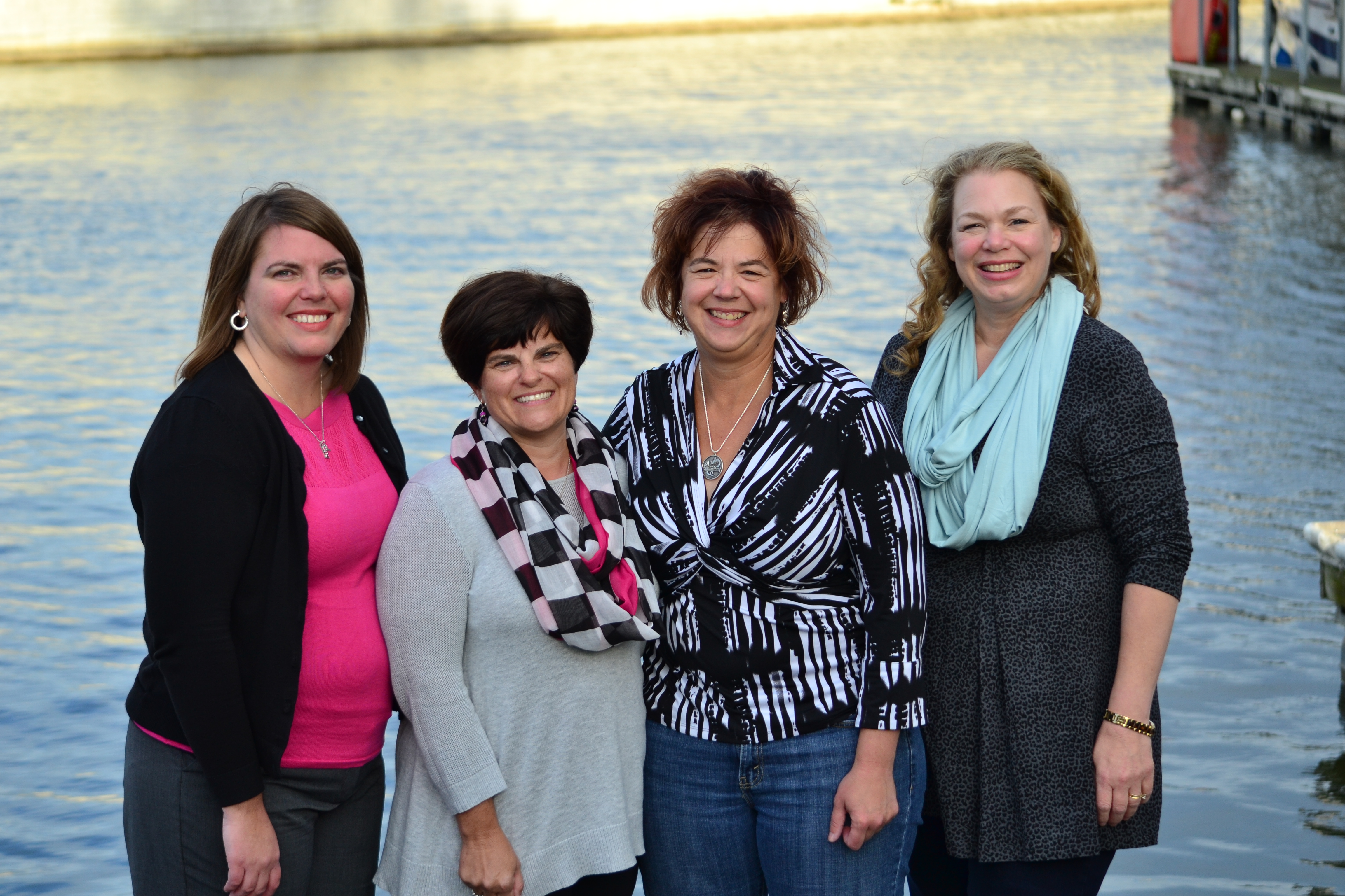 From left, Elizabeth Anderson, Yopi Havlik, Sarah Demmon, and Lori Goldsby, all Fishers residents and breast cancer survivors. They are in different stages of recovery and each wrote a very personal letter to their cancer. (Photo by John Cinnamon)