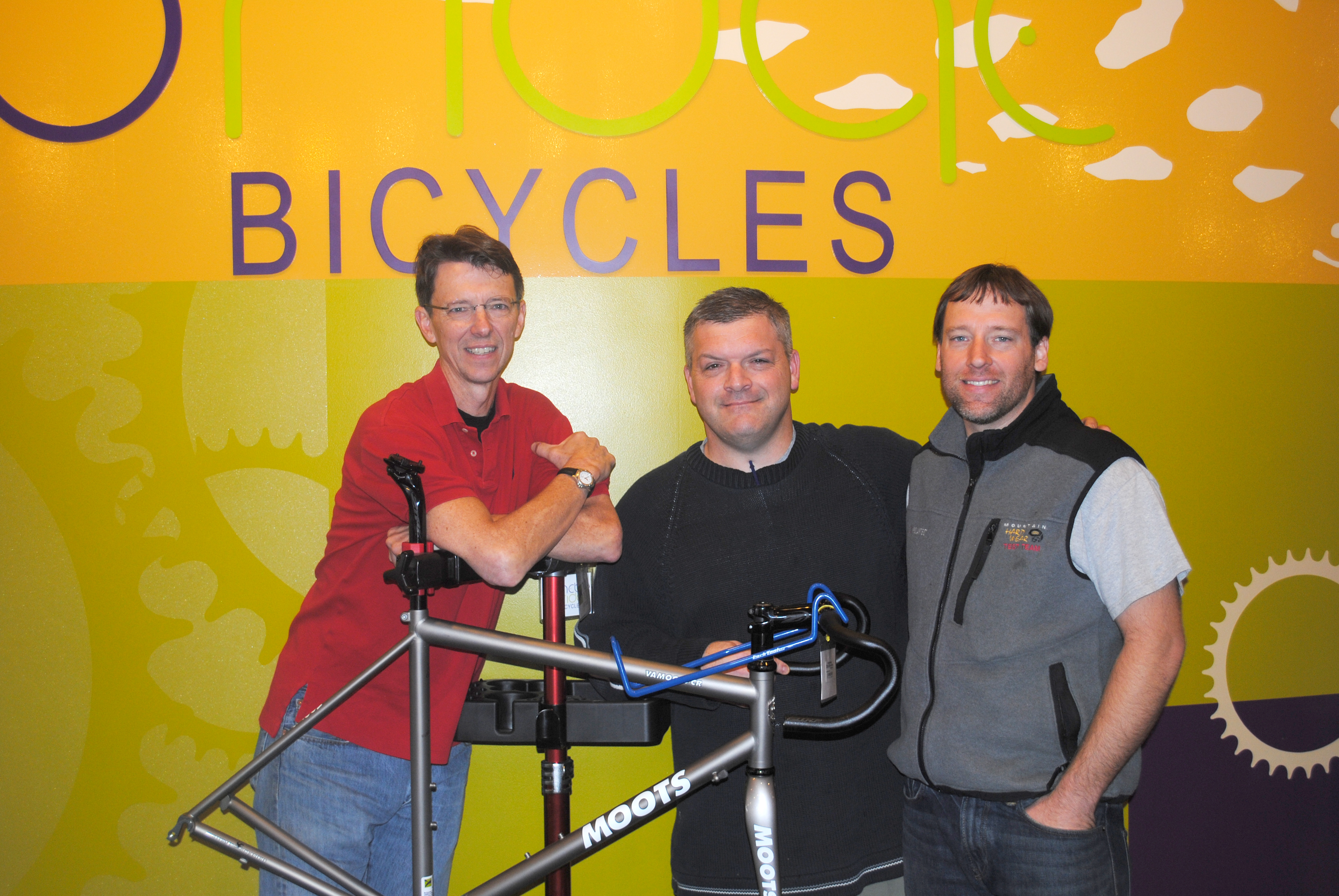 From left, Nebo Ridge Bicycles owner Tim Casady, author Jim Serger and Nebo Ridge general manager Brian Wenrick. (Photo by Mark Ambrogi