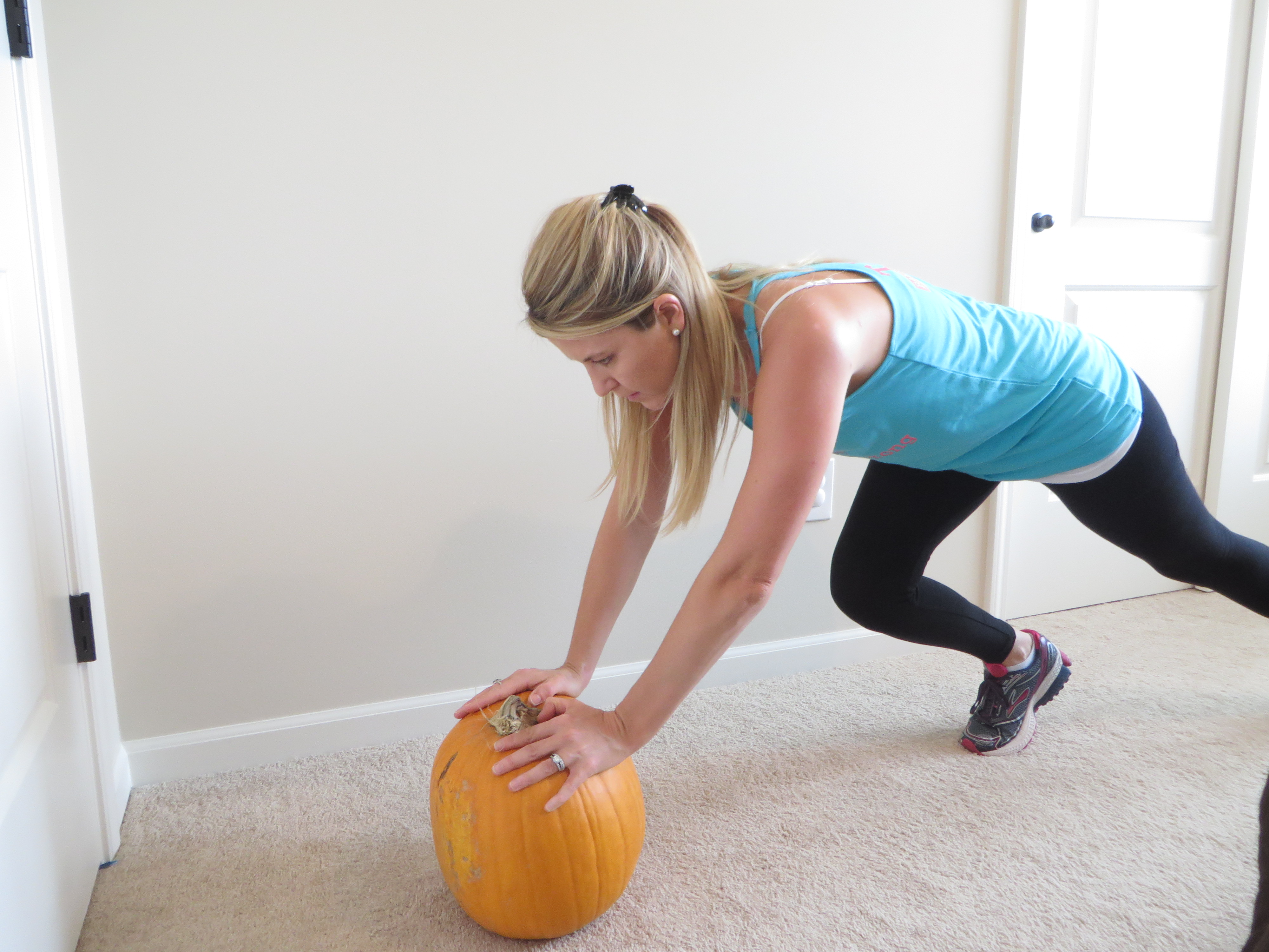 Fitness instructor Kara Babcock shows how to do exercises with pumpkins. (Submitted photos)