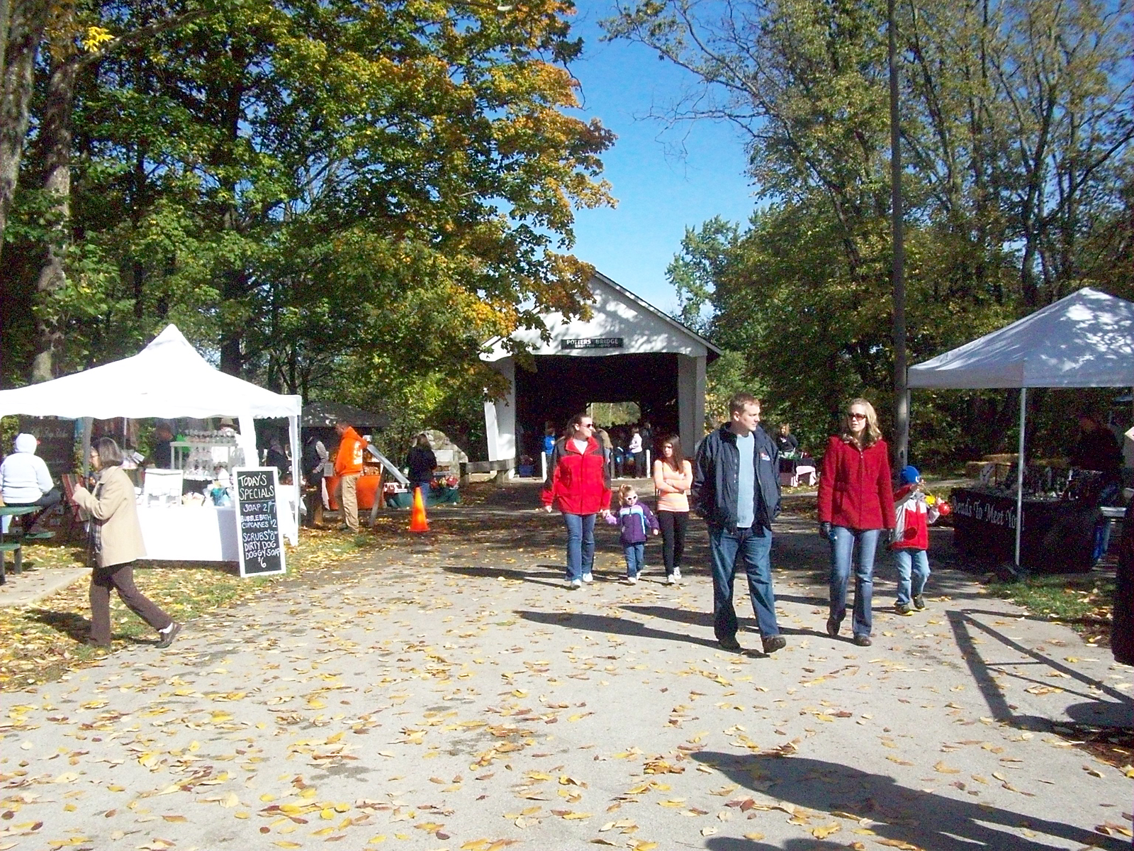 Arts and craft vendors fill the outside and inside of Potter’s Bridge during the annual fall festival. Organizers said more than 70 vendors will attend this year’s event. (File photo)