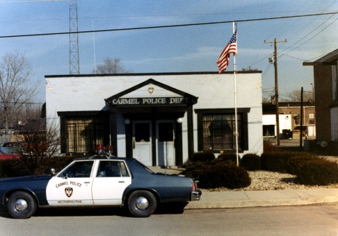 A Carmel Police Dept. vehicle in front of what used to be police headquarters. (Submitted photo courtesy of the Carmel Clay Historical Society)