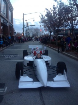 Last year, Santa came to Carmel in a racecar. This year, IndyCar driver Sarah Fisher will drive Santa into Clay Terrace on Nov. 22. (Submitted photo)