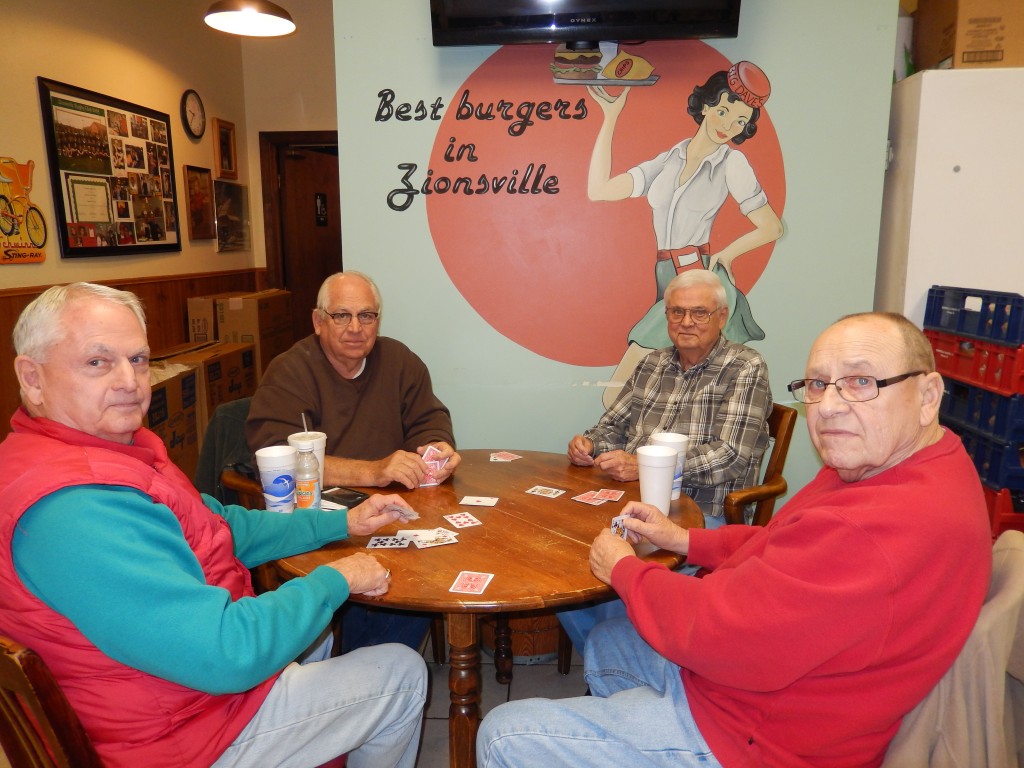 From left) Euchre players Sam Fix, Dan Fix, Gene Reynolds, and Lowell Lemon sit inside Dave’s Deli (Submitted photo)