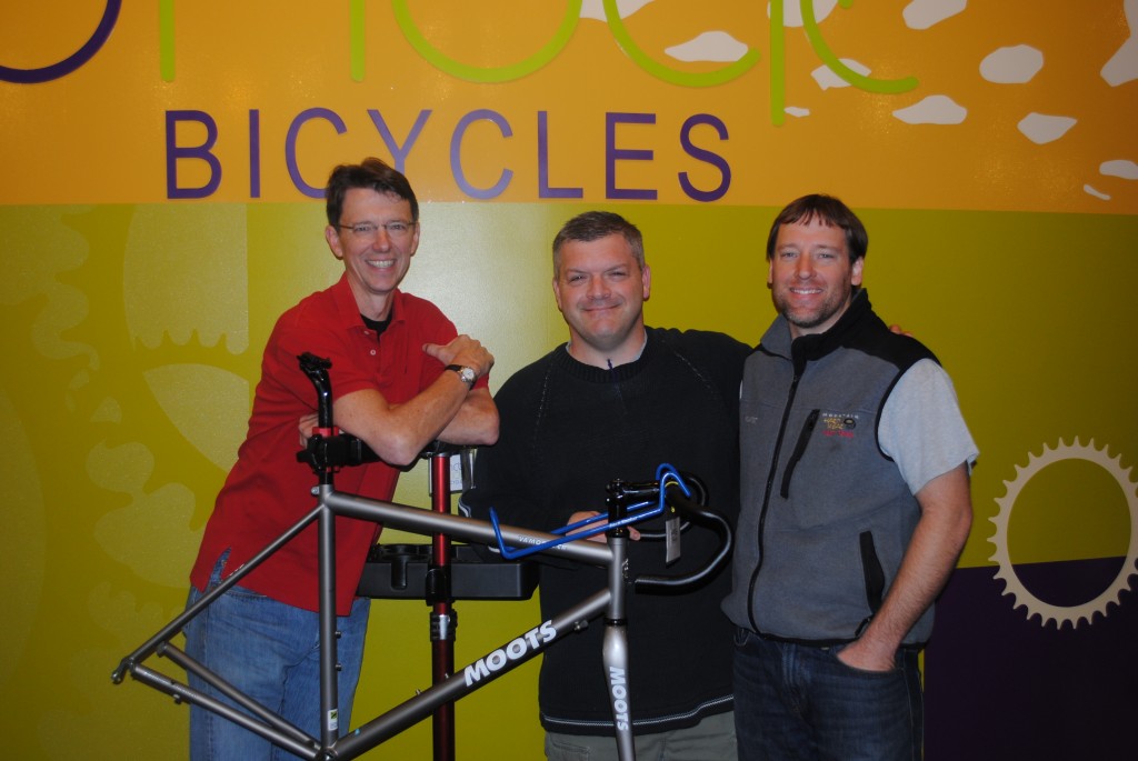 From left, Nebo Ridge Bicycles owner Tim Casady, author Jim Serger and Nebo Ridge general manager Brian Wenrick. (Photo by Mark Ambrogi)