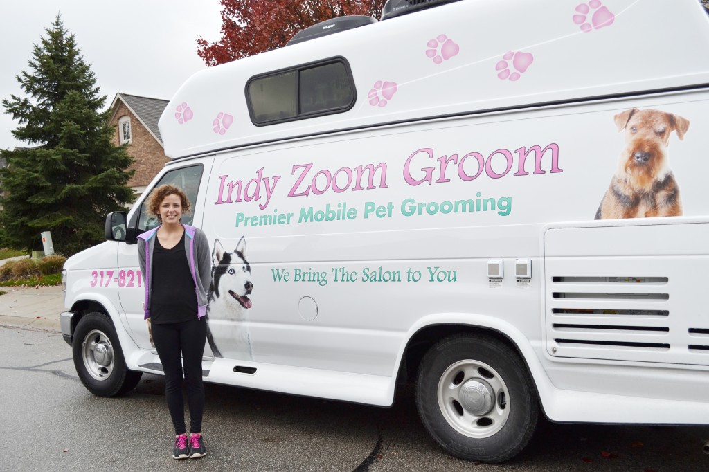 Haley Brown and her new mobile dog grooming van. Indy Zoom Groom focuses on the Fishers and Geist area. (Photo by Ann Craig-Cinnamon)