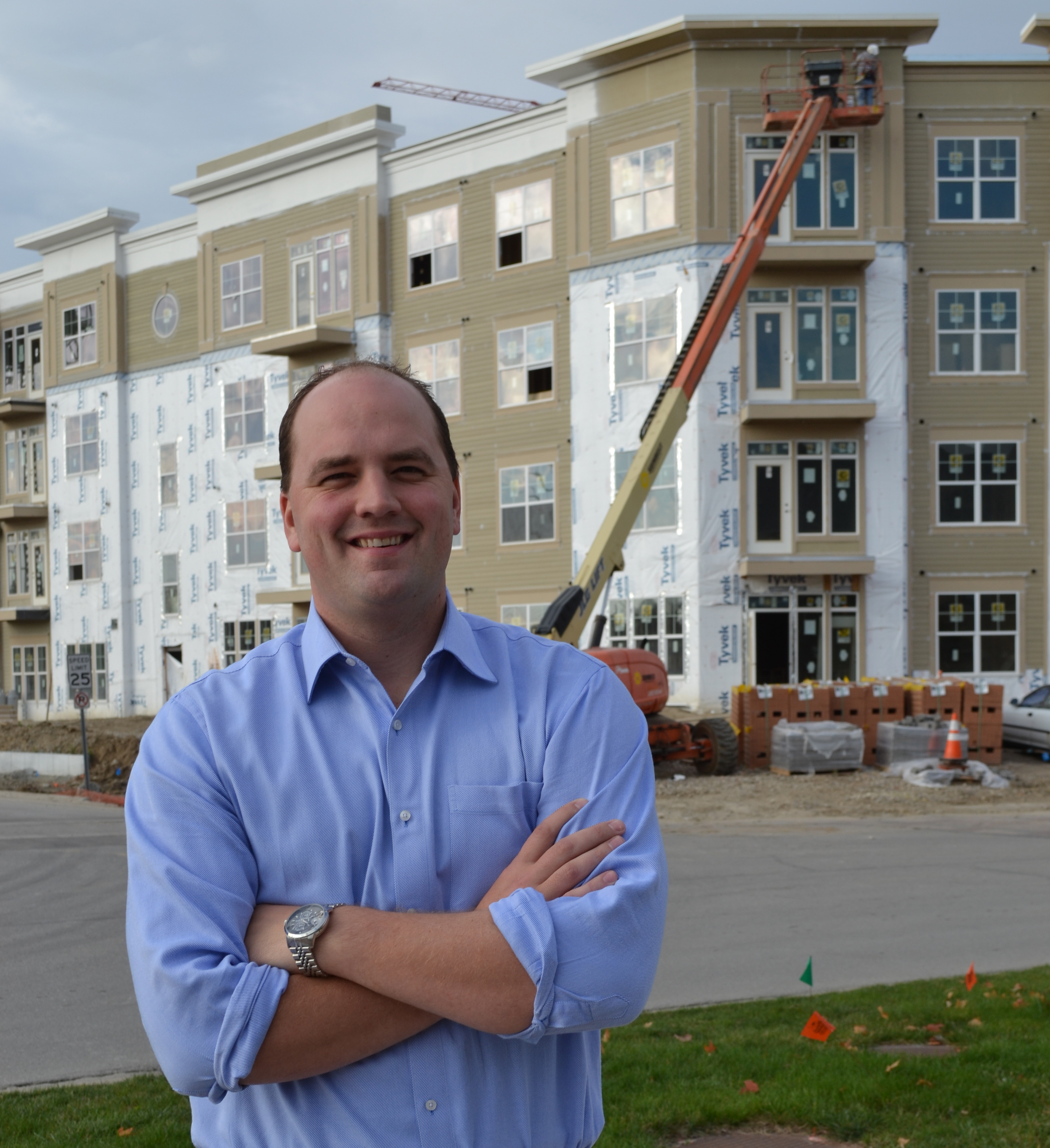 Fishers Town Manager and Mayor-elect Scott Fadness stands in front of the construction projects he has spearheaded in downtown Fishers. (Photo by John Cinnamon)