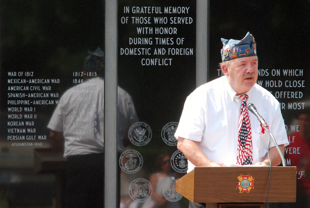 Ron Wilson leads a Memorial Day ceremony at Riverside Cemetery in Noblesville. (File photo)