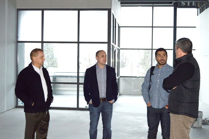 From left, Tim Russell, president of Meyer Najem, Anderson Schoenrock, CEO of Memory Ventures, Santiago Jaramillo, CEO of Bluebridge and Tom Dickey, director of community development. (Photo by Beth Taylor)