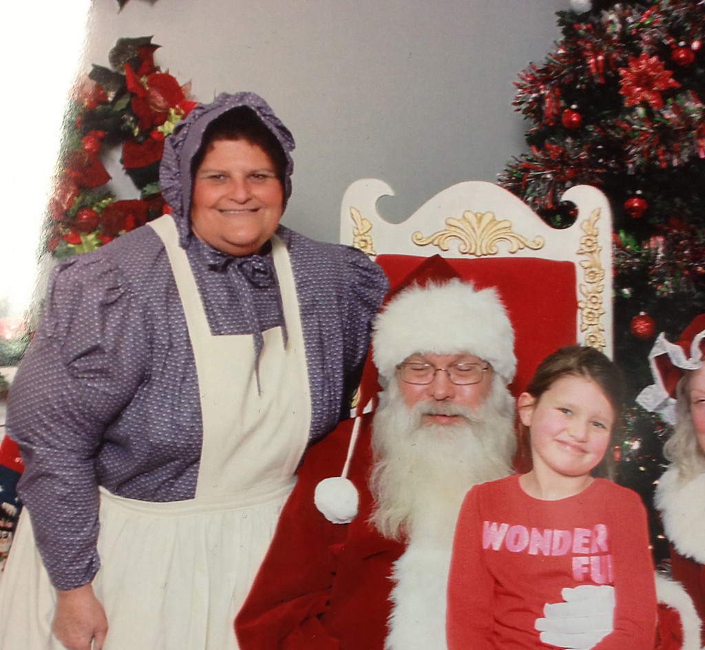 Diana Peyton and her granddaughter, Madison, visit Santa Claus while enjoying the festivities of Westfield in Lights on Dec. 6. (Submitted photo)