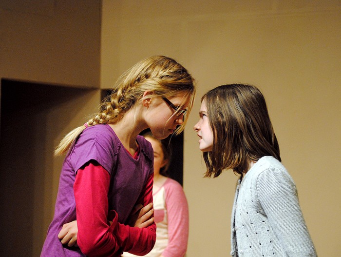 Beth Bradley (Leah Kerkhoff), left, and Alice Wendlekin (Audrey Duprey) get in a heated argument about the Herdmans behavior in “The Best Christmas Pageant Ever.”