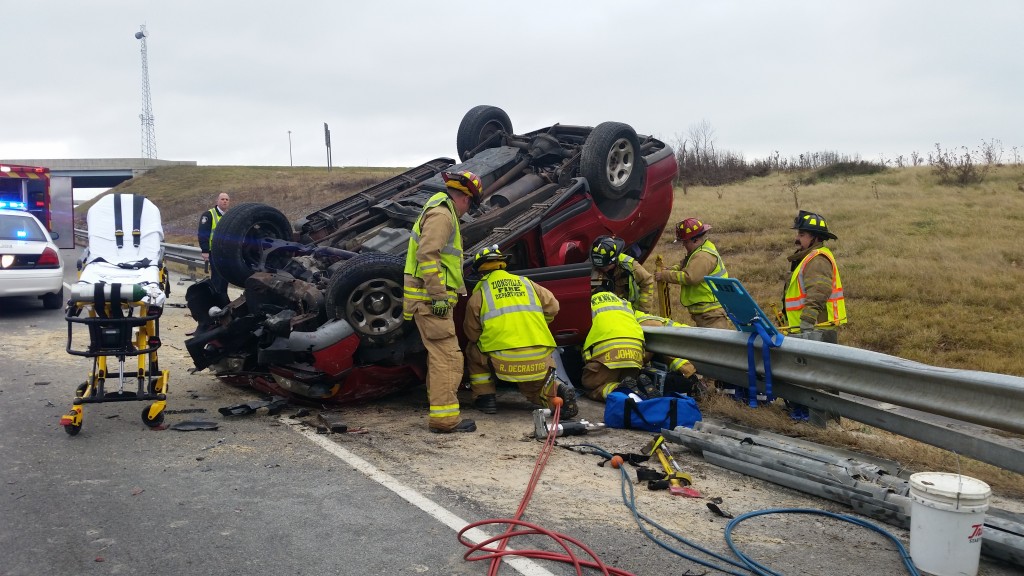 Firefighters working on extrication of patient during a Dec. 9 car accident. (Submitted photo)