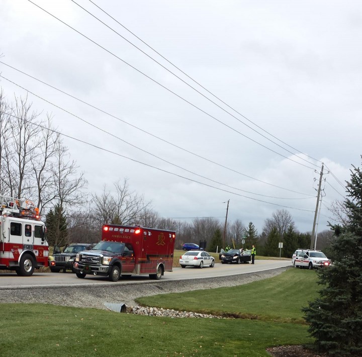 Scott Prince took a photo of this traffic accident with injuries outside of his home near 116th Street and Hoover Road on Dec. 23. He said the dips in the road, combined with the 40 mph speed limit, make it difficult to see cars turning in and out of driveways. (Submitted photo)