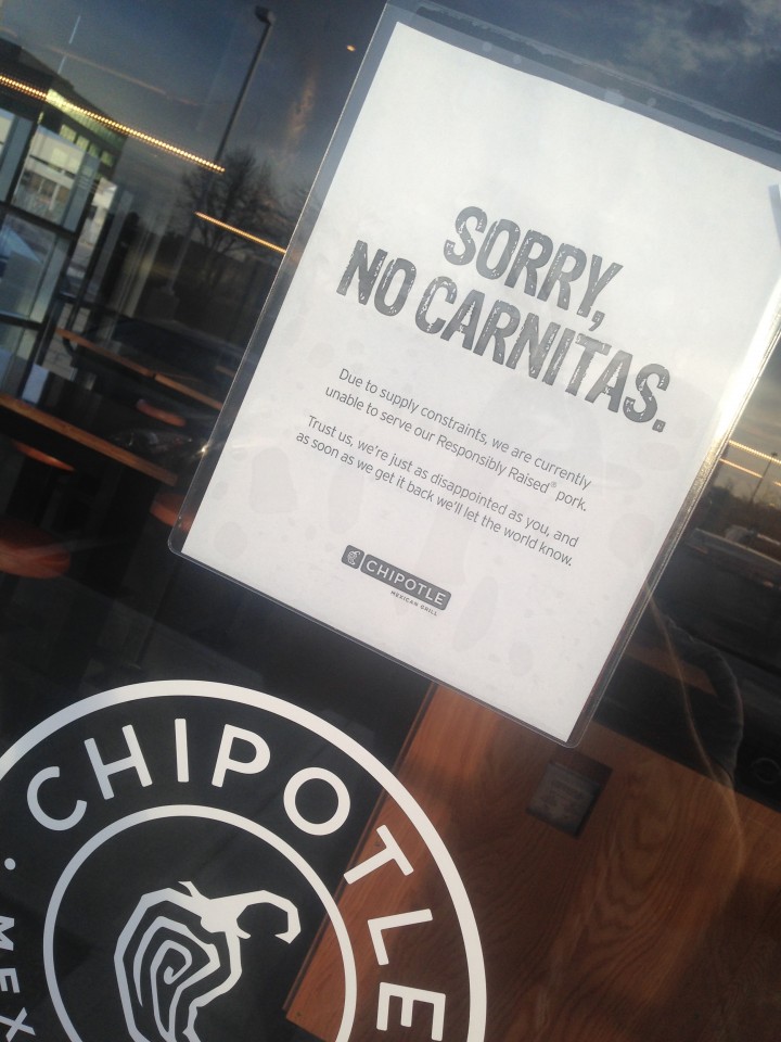A sign on the door states it clearly, no pork carnitas for diners. (Photo by Adam Aasen)