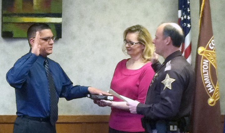 Merit Deputy Juan Munoz is sworn in by Hamilton County Sheriff Mark Bowen on Jan. 12. (Submitted photo) 