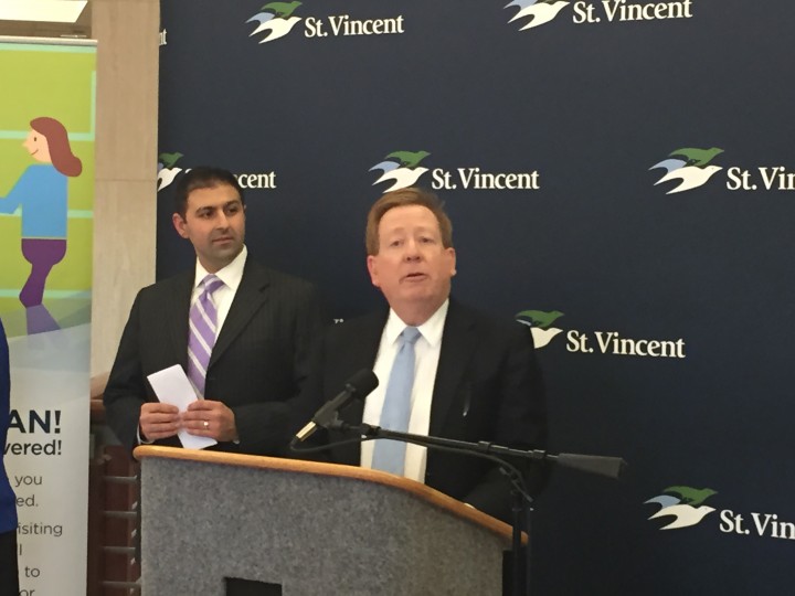 Jonathan Nalli, CEO of St. Vincent, stands alongside Carmel Mayor Jim Brainard during a press conference Jan. 13. (Photo by James Feichtner)