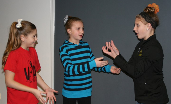 Pictured are Hailey Reed (age 10 from Fishers), Abbie Burns (age 10 from Carmel), and Bella Doss (age 11 from Westfield) during a Rising Stars workshop. Fun theatre games were used to teach students improvisational skills. (Submitted photo)