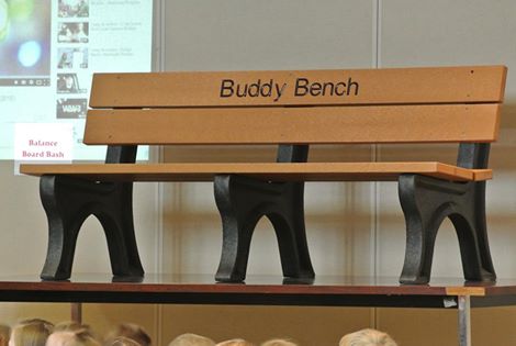 The “Buddy Bench” helps TPCA students learn to reach out to others, building on the school’s theme this year to “Love One Another.” (Submitted photo)