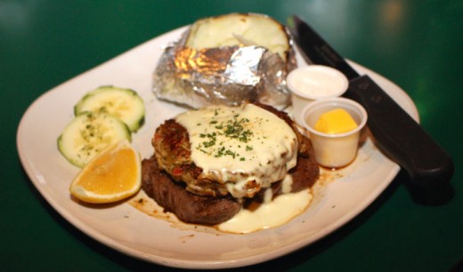 Murphy’s Pubhouse Filet Mignon, Oscar Style, served with a baked potato, butter and sour cream on the side.
