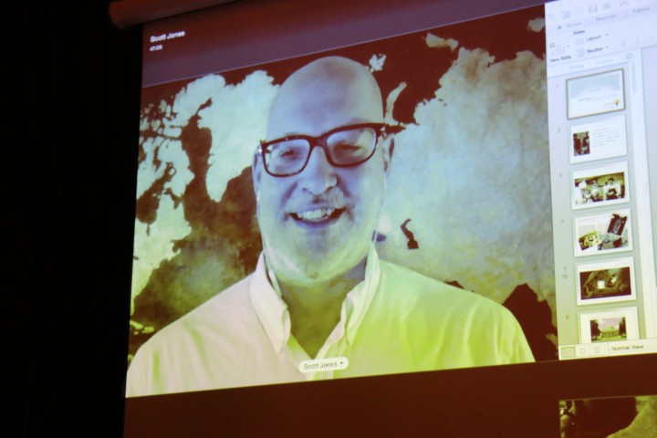 Scott Jones was unable to attend the event due to a medical illness, so he spoke via Skype from Hawaii.