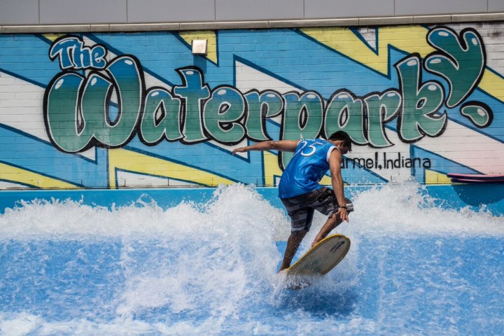 A Monon Community Center member takes a turn on the FlowRider surfing system. (Submitted photo courtesy of Carmel Parks and Recreation)