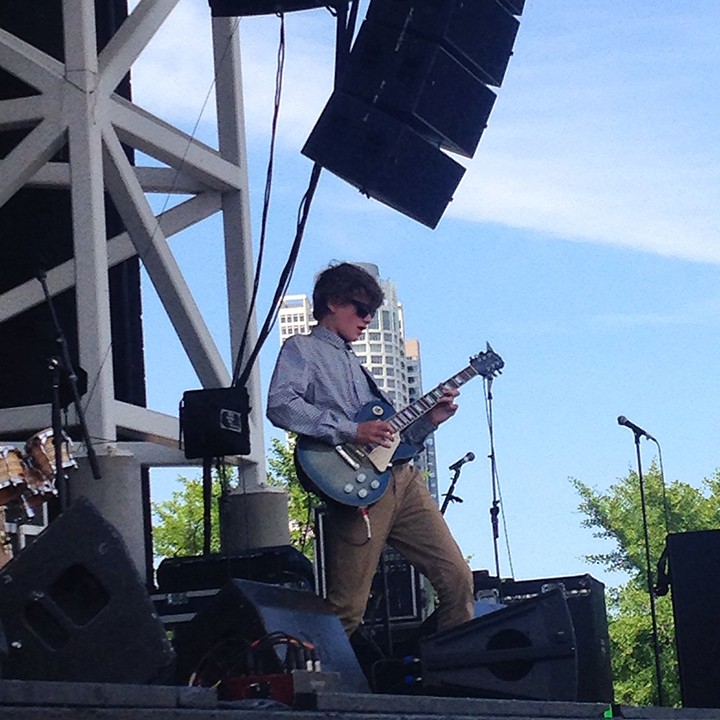 Alex Turner, a student from the School of Rock in Carmel, performs on stage at Summerfest. (Submitted photo)
