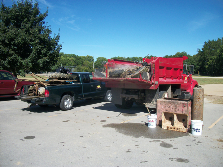 Participants filled the back of pickup trucks with trash during the creek clean up in 2013. (submitted photo)