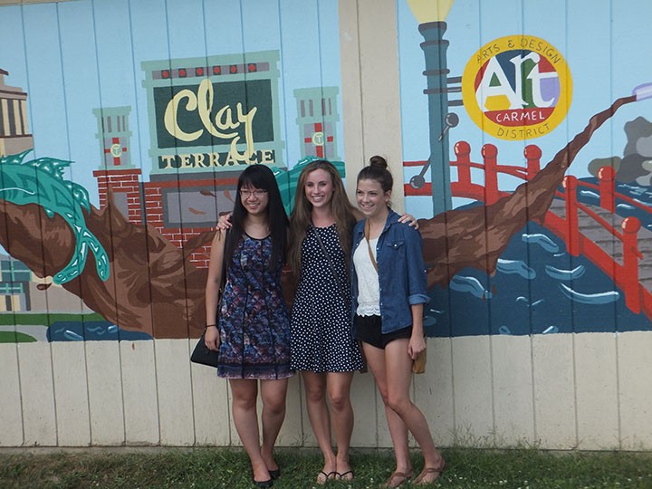 Katy Voor, Sydney Hartwick and Dana Wang with their mural. (Photo by Kayla Nakeeb)