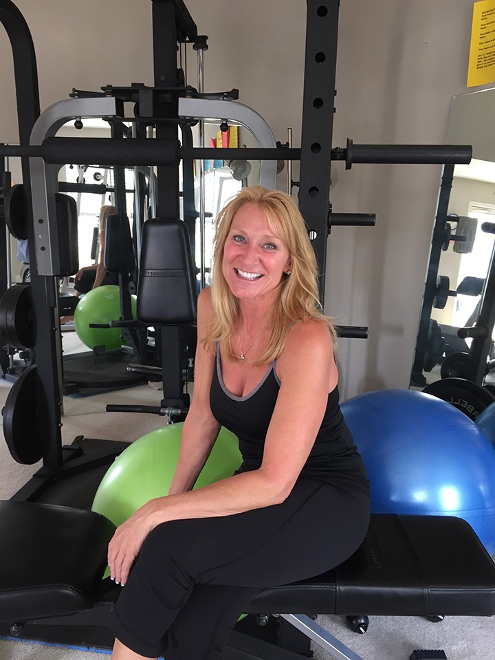 Sams at her in-home gym in Fishers. (Photo by James Feichtner)