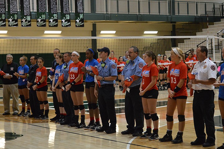 Volleyball players recognize first responders at last year’s event. (Submitted photo)