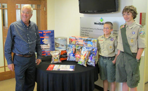 From left: Mayor Andy Cook kicks off popcorn sales with boy scouts Braden Season and Jonah Santellana. The sales will last from Sept. 19 to Oct. 18. (Submitted photo)