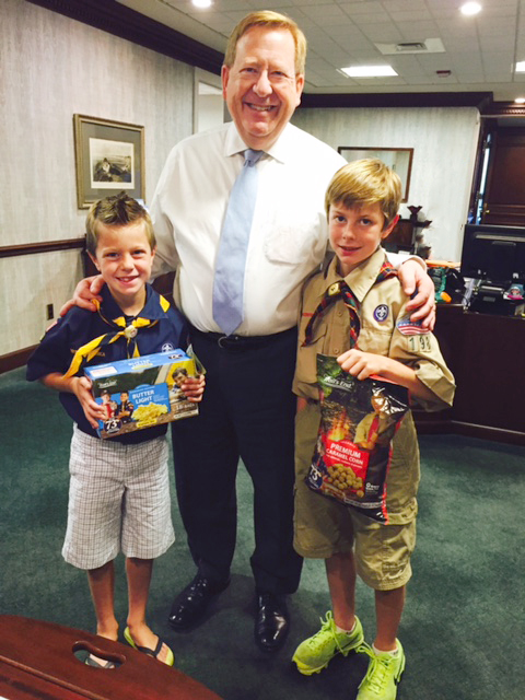 Carmel Mayor Jim Brainard, center, welcomes Carmel Boy Scouts Grant and William Garner to his office Sept. 21. 