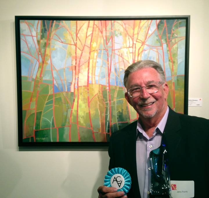 Jerry Points, who organized Carmel on Canvas for its first year, with one of his paintings. (File photo)