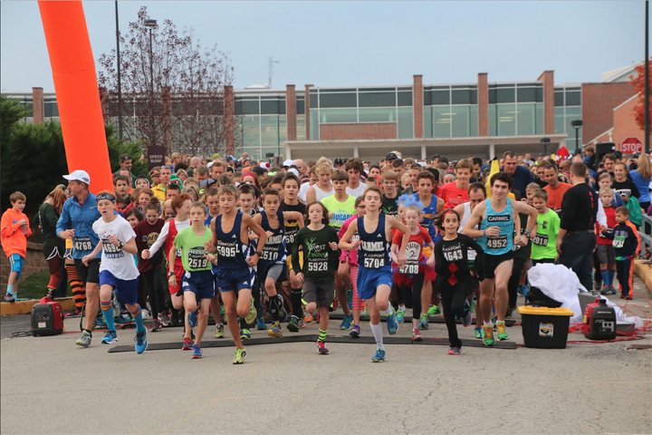 Racers take off across the starting line at the 2014 Ghosts & Goblins 5K. (Submitted photo)