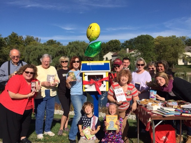 Residents of the Shadybrook neighborhood gather to celebrate their new Little Free Library. (submitted photo)