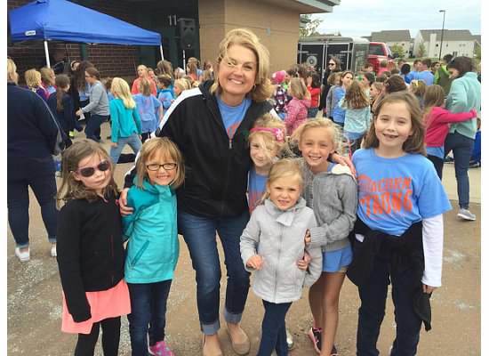 Oak Trace Elementary School principal Robin Lynch celebrates the achievement with some of Oak Trace’s students. (Submitted photo)