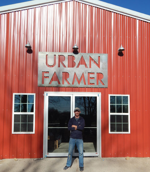 Noah Herron stands by the new location for Urban Farmer, 120 E. 161st St. (Submitted photo)