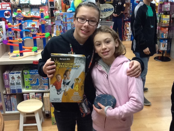 Sarah and Rachel Beck enjoy the National Neighborhood Toy Store Day at Earth Explorer Toys in 2014. (submitted photo) 