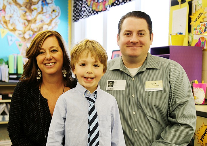From left, teacher Kathryn Barker, student Owen Fluhler and Market District’s Dan Mixan. (Photo by Feel Good Now)