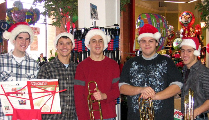 CHS grads and friends reunite each year to play Christmas music in Carmel. In 2010, performers included, from left, Dan Alred, Glen Dash, George Todd, Daniel Smith and Corey Dash. (submitted photo)