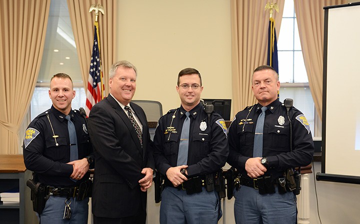 Carmel City Judge Brian Poindexter, second from left, opened his chambers for a presentation from the Indiana State Police troopers – from left, Ryan Kenworthy, Jon Caddell and Aaron Gaul – on how to respond in an active shooter situation. (Photo by Theresa Skutt)