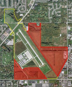 An aerial view of Indy Metro Airport. The areas outlined in red are planned development areas. (Submitted map)