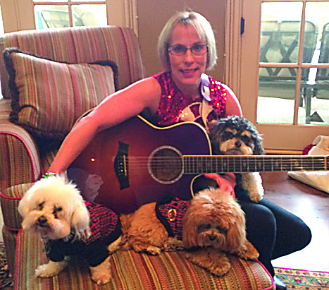 Singer Sandi Smith with her dogs and guitar. (Photo by Mark Ambrogi)