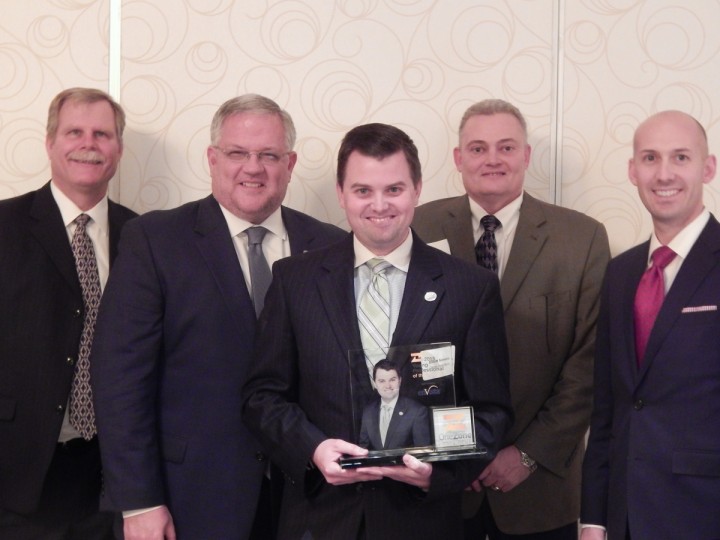 Jerry Daniken, branch manager of the Carmel Citizens State Bank office, John DeLucia, chief lend- ing officer at Citizens State Bank, Elliott Somers, who was named the young Professional of the year, Roger Wells, retail banking director at Citizens State Bank, and Dan Maddox, chief operating officer at Citizens State Bank. (Submitted photo)