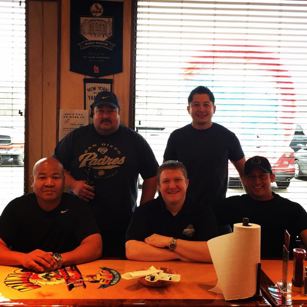 From left, Fishers firefighters Matt Steele, Jeff Hague, Mark Taylor, Marcus Boffing and Tony Zentz ate 50 “wall sauce” wings in less than three minutes. (Submitted photo)
