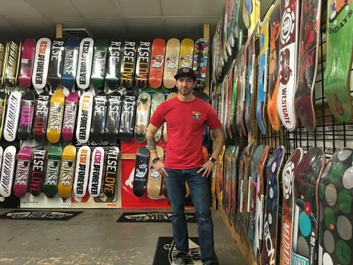 Scott Cullumber in the skateboard shop on South Range Line Road. (Photo by Adam Aasen)