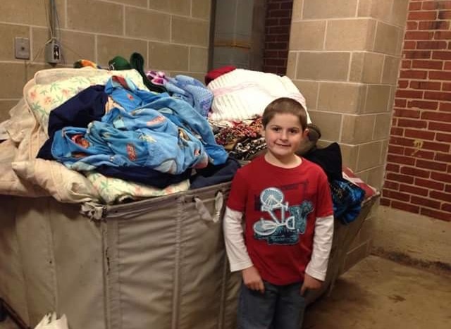 Mt. Comfort Elementary student Hunter Lenk collected and donated more than 500 blankets for residents of Wheeler Mission. (Submitted photo)